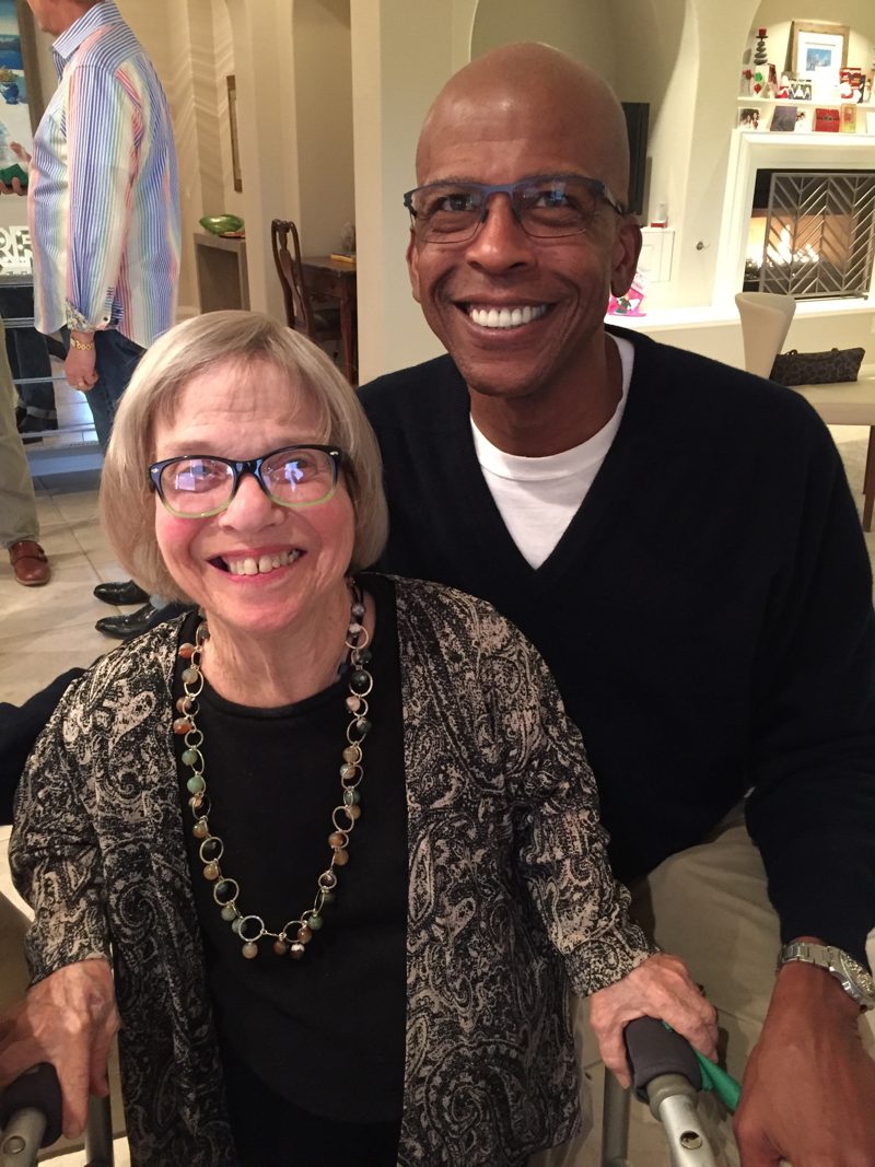 Two CSPcv supporters smiling together at a holiday gathering
