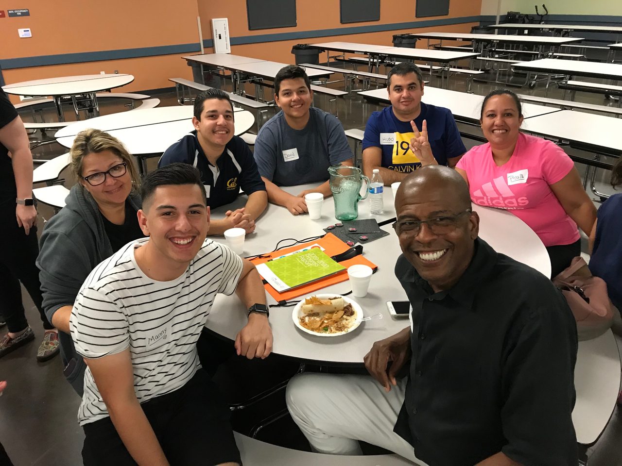 Dennis Reed with scholars and their families at a program gathering